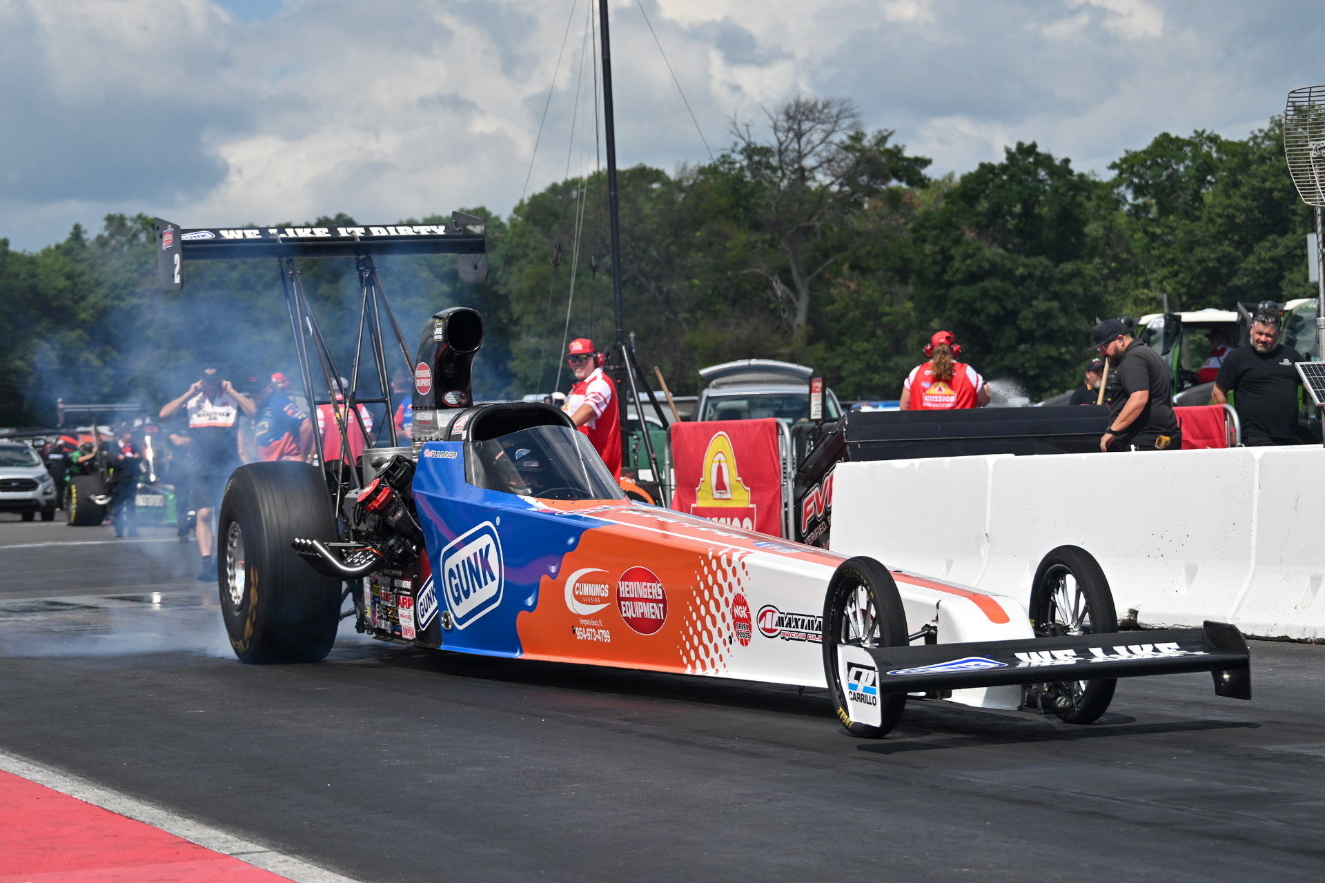 Gunk-liveried Randy Meyer Racing top alcohol dragster doing a burnout