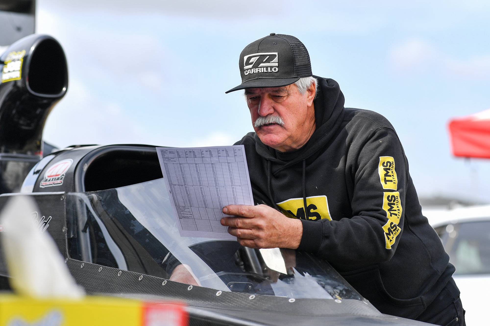 Randy Meyer reviewing race data trackside